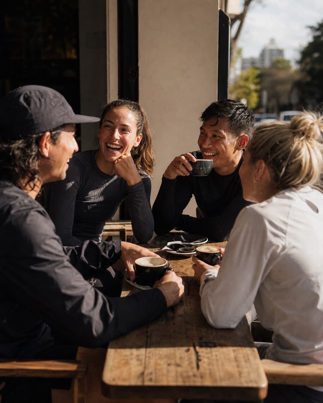 Runners talking together after a morning group run